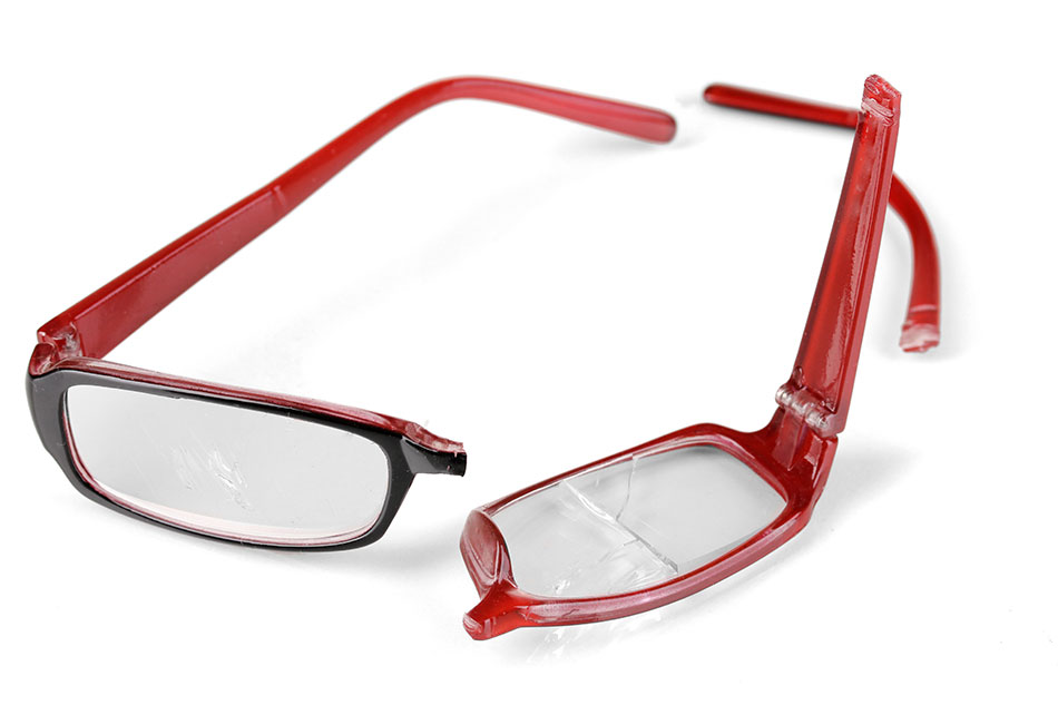 Broken red plastic glasses