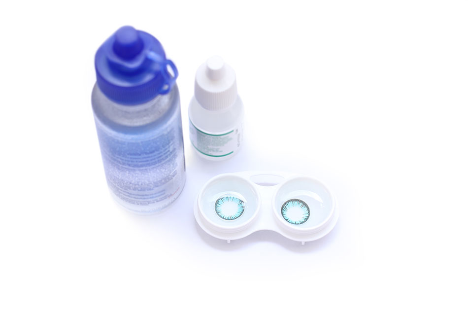 Bottles of the best contact solution with a lens case and contacts inside