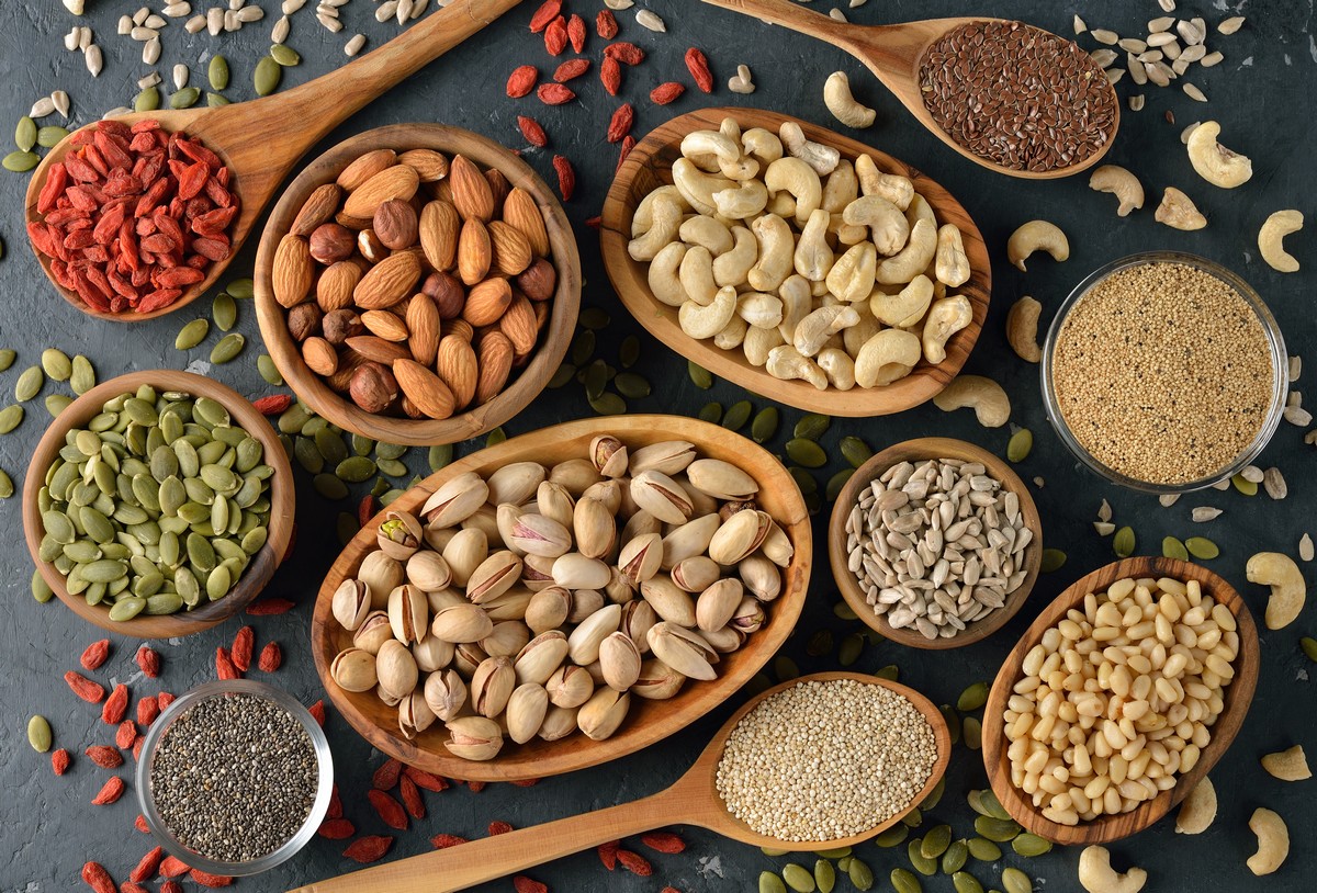 nuts and seeds in various wood bowls