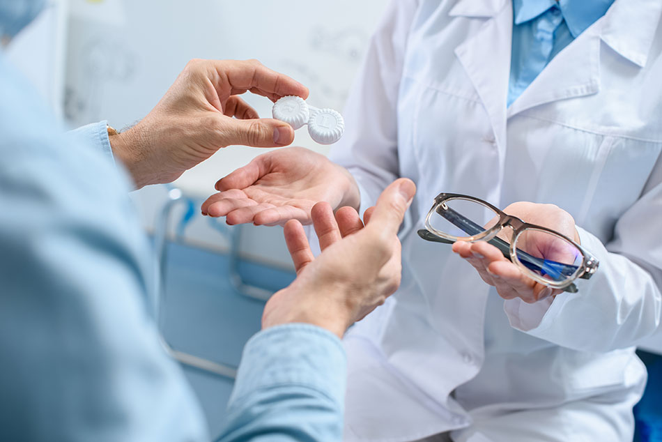 Patient recognizing the benefits of contacts at doctor’s office