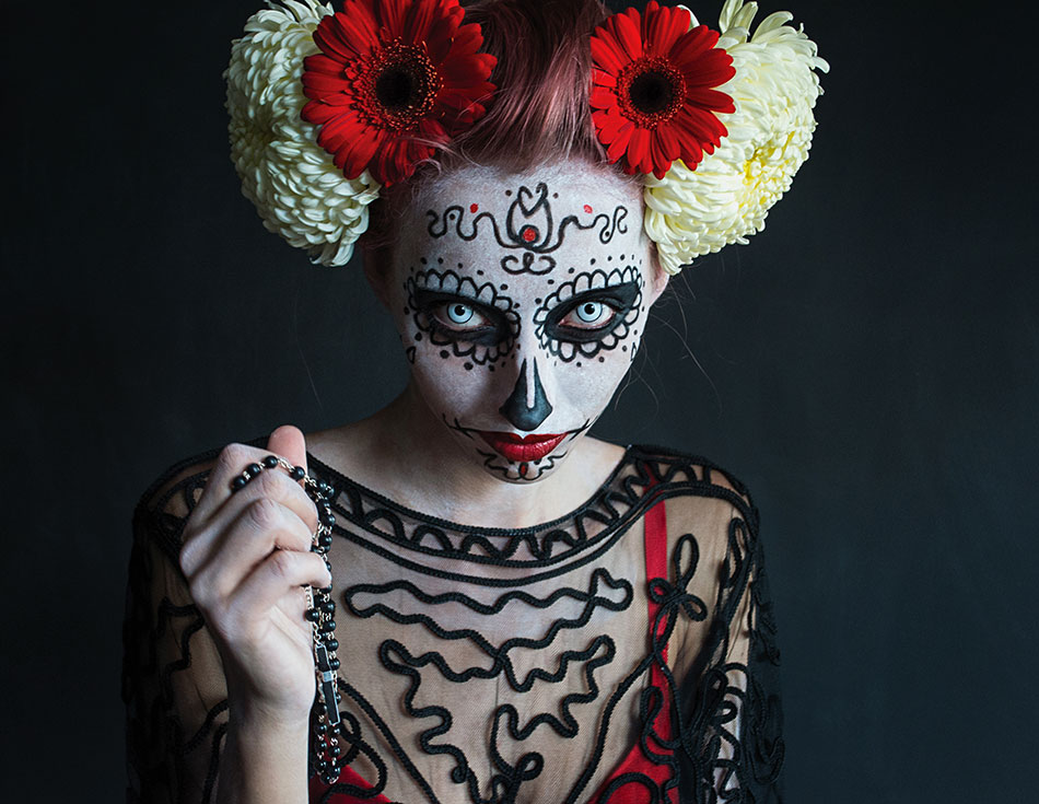 woman wearing full costume with colored contact lenses