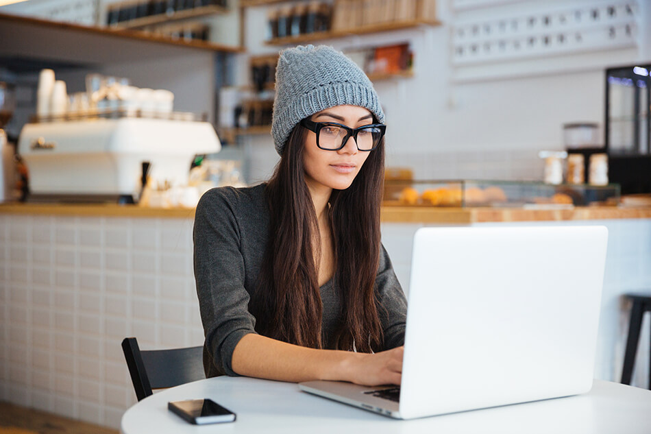 woman at computer, ordering contact lenses online