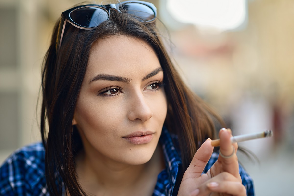 woman smoking cigarette