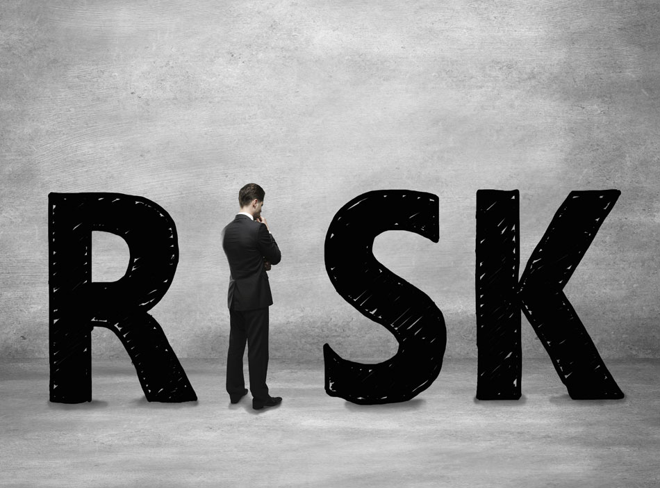 word risk with businessman standing in for the letter i